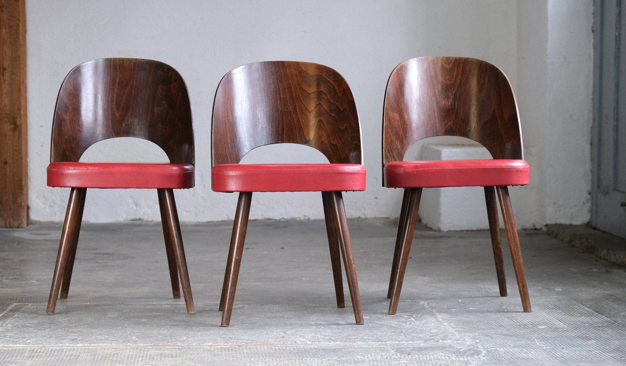 Vintage chair by Oswald Haerdtl with dark red imitation leather One of 3